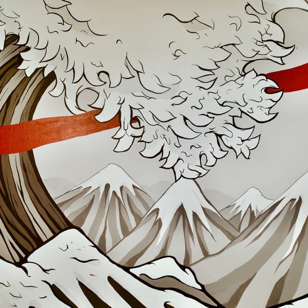 Japanese-style mural of a large wave, red ribbon, and snow-capped mountains in sepia tones.